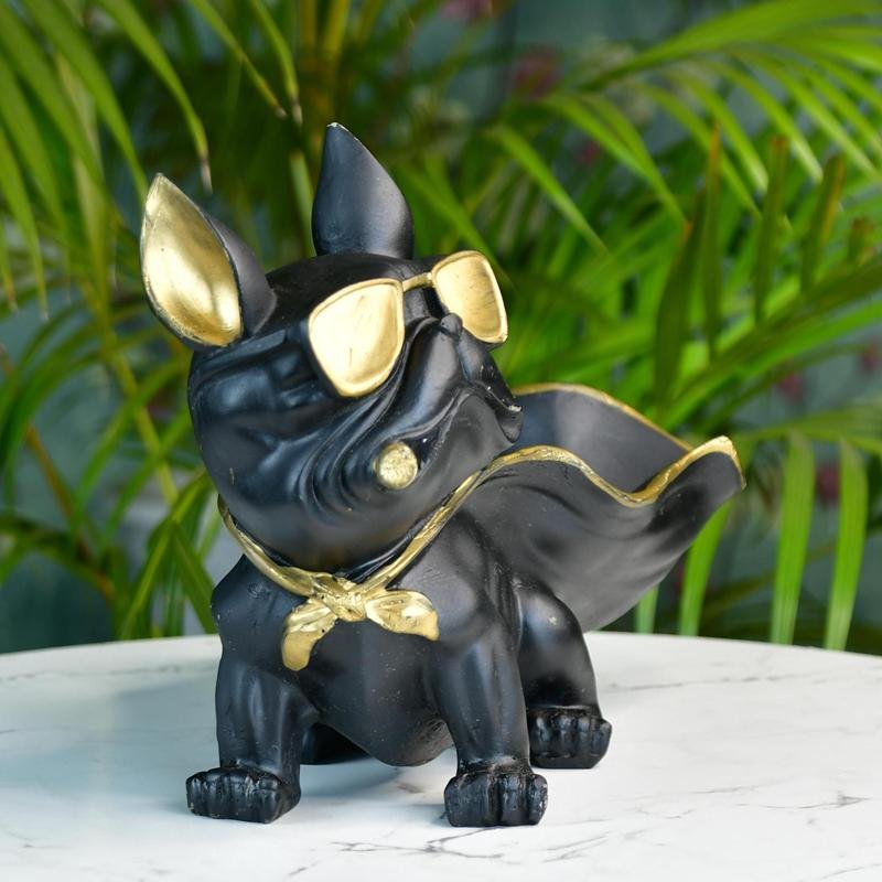MAYII tabletop cape dog figurine decor in black with gold cape and sunglasses on white marble surface