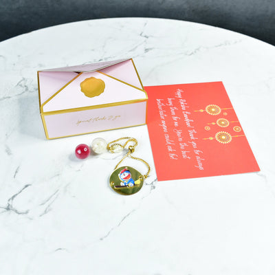 Mayii Exquisite Doraemon Rakhi Pack of 1 with Roli Chawal and Greeting card combo for Raksha Bandhan and Gifting