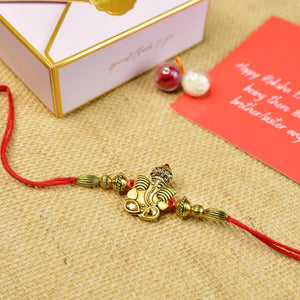 Mayii Exquisite Golden Ganesha Rakhi Pack of 1 with Roli Chawal and Greeting card combo for Raksha Bandhan and Gifting - Mayii - Mayii