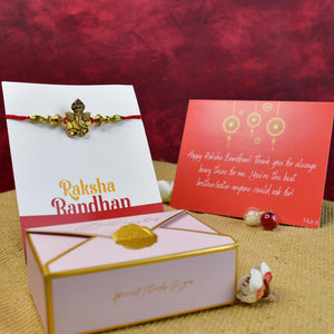 Mayii Exquisite Golden Ganesha Rakhi Pack of 1 with Roli Chawal and Greeting card combo for Raksha Bandhan and Gifting - Mayii - Mayii
