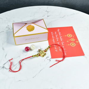 Mayii Exquisite Golden Ganesha Rakhi Pack of 1 with Roli Chawal and Greeting card combo for Raksha Bandhan and Gifting - Mayii - Mayii